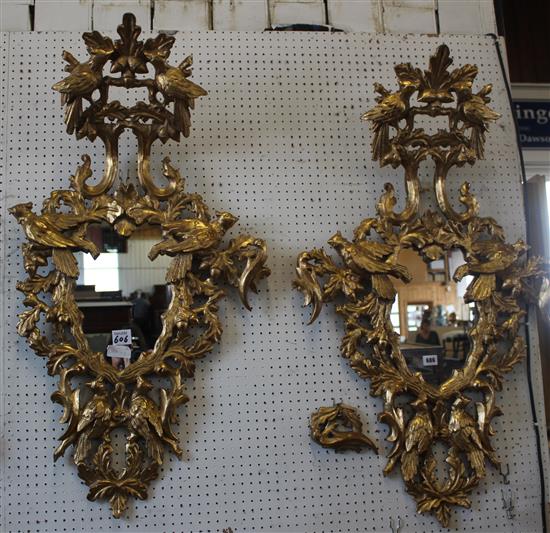 A pair of Spanish giltwood wall mirrors